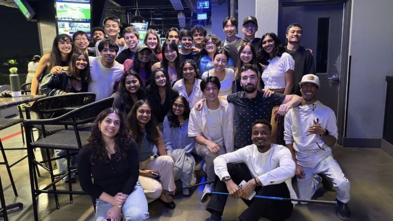 Ashley pictured alongside other ServiceNow interns at a golfing event.